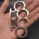 Fist buckle glove iron four-finger tiger ring martial arts fight defense tool metal skull hand buckle hand support - immagine 2