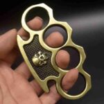 Fist buckle glove iron four-finger tiger ring martial arts fight defense tool metal skull hand buckle hand support - immagine 4