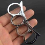 The new knuckle copper ring four-finger ring hand brace small cute shoulder pole finger tiger fist buckle ring iron four-finger hand buckle - immagine 2