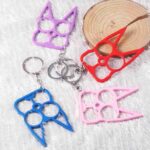 Multi-color Outdoor Self-defense Multifunctional Keychain Creative Wrench Key Ring Pendant Two Finger Buckle Bag Car Accessories - immagine 19