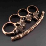 Four-fingered white bone fine hand buckle fist ring finger tiger metal hand support child fist buckle finger ring martial arts fight knuckle copper sleeve - immagine 2