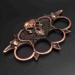 Metal bull head iron four-fingered fist buckle four-fingered ring martial arts fight finger tiger hand Kui hand buckle with car equipment finger buckle - immagine 4