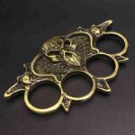 Metal bull head iron four-fingered fist buckle four-fingered ring martial arts fight finger tiger hand Kui hand buckle with car equipment finger buckle