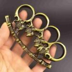 Four-fingered white bone fine hand buckle fist ring finger tiger metal hand support child fist buckle finger ring martial arts fight knuckle copper sleeve - immagine 8